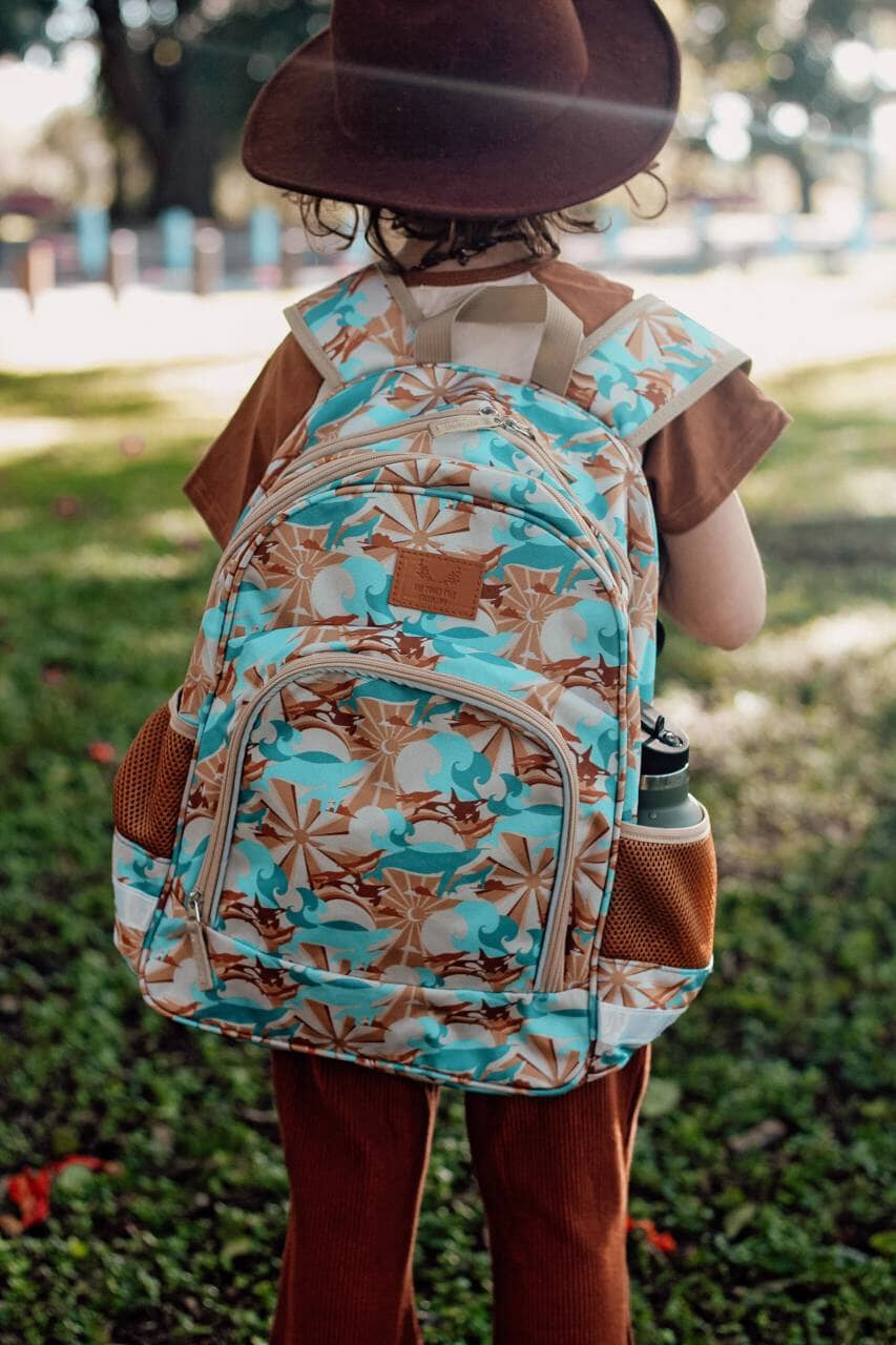 whales and sun on kids backpack